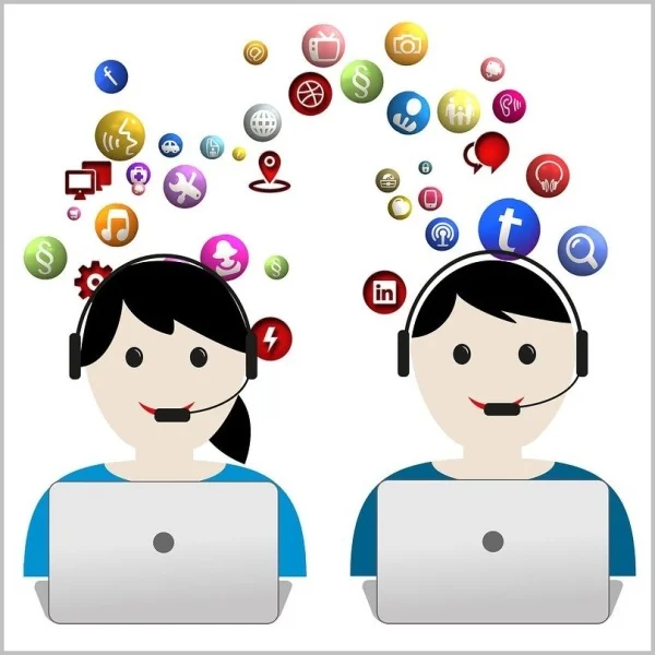 Das Bild zeigt zwei Comicfiguren mit Laptops
