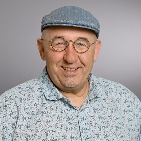 Das Bild zeigt ein Porträt von Peter Fröhlich