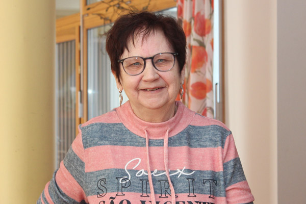 Tag der Pflegenden Eine Portraitfoto einer Frau, die lächelt.